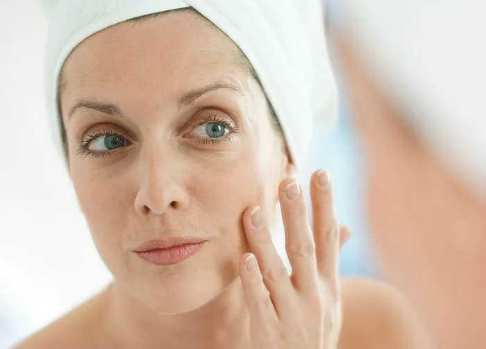 woman-checking-skin