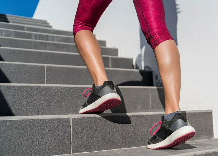 woman-running-up-stairs