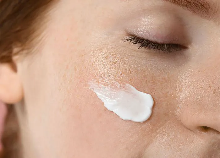 woman-retinol-cream-face