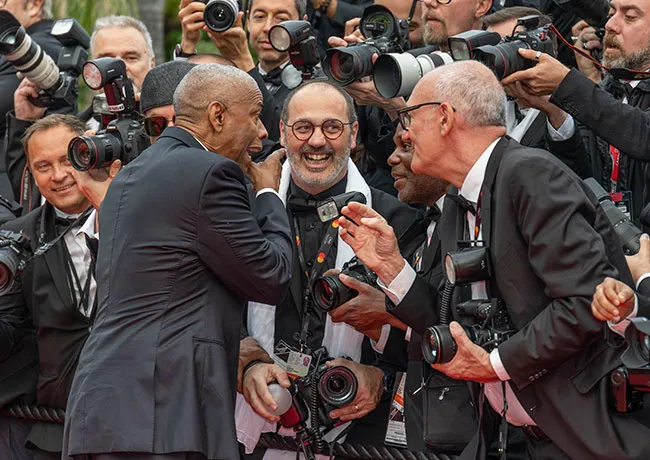 Denzel Washington touched by photographer Highest 2 Lowest premiere Cannes Film Festival
