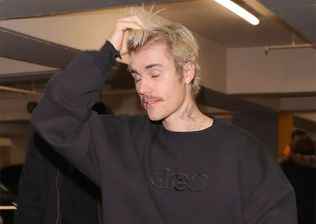 Justin Bieber looks confused at Selfridges