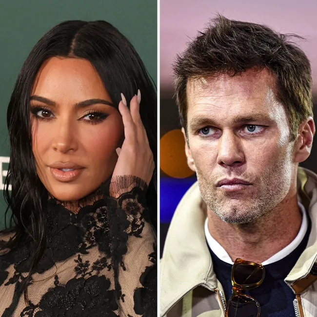 Kim Kardashian and Tom Brady pose together at an event.