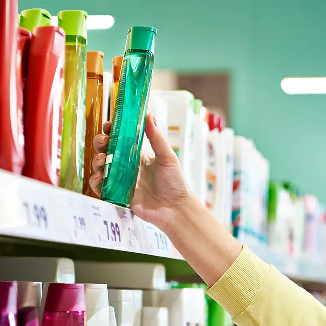 woman-grabbing-shampoo