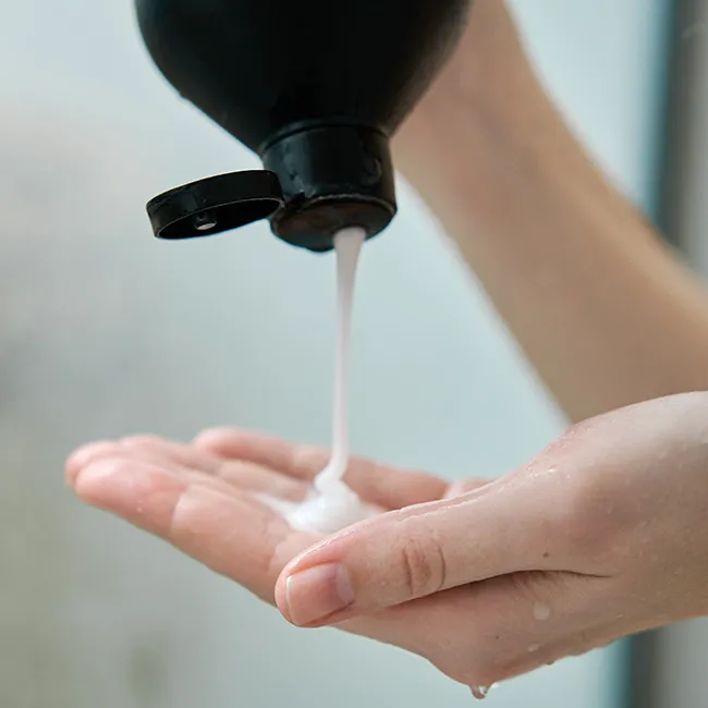 squeezing-shampoo-in-hand