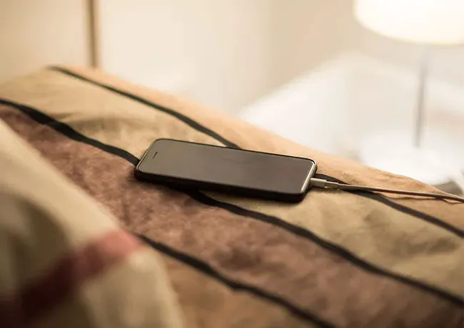 phone-charging-on-bed