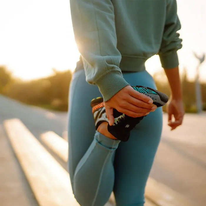 woman stretching before morning exercise