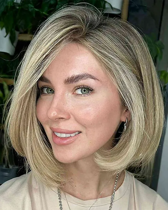 "Face framing bob haircut style"