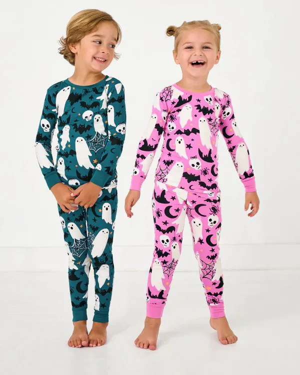 Kids dressed as spooky characters for Halloween fun.