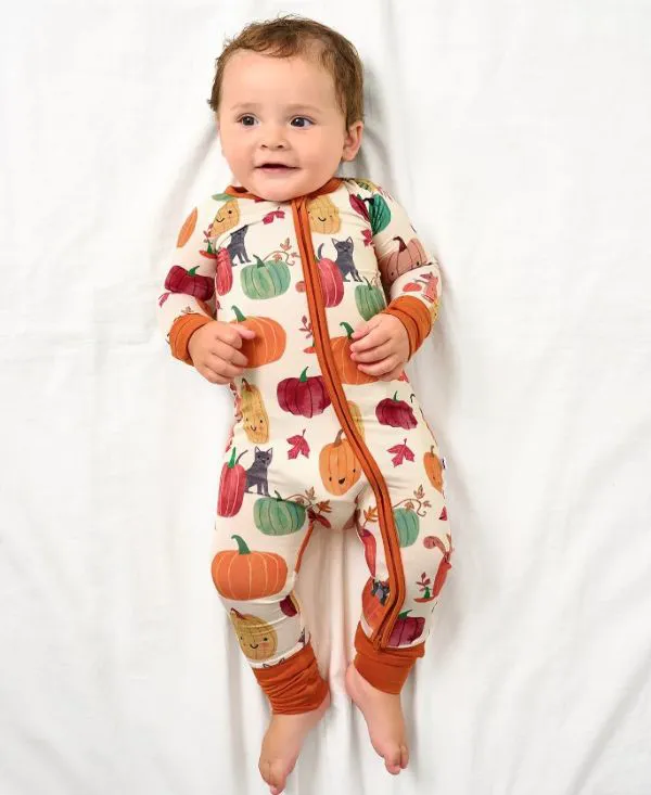 Cute pumpkin-themed outfit for Halloween celebrations.