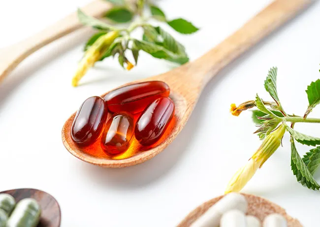 supplements-on-wooden-spoon