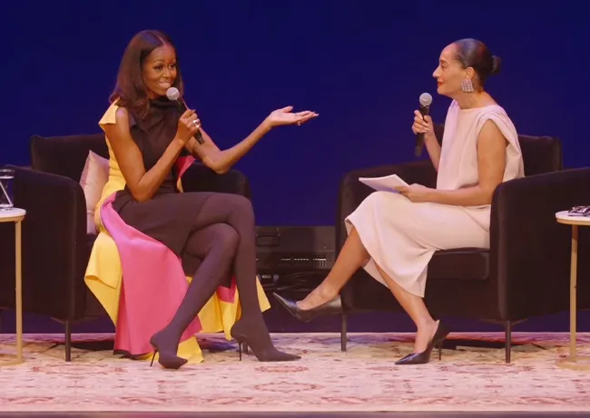Michelle Obama talking with Tracee Ellis Ross