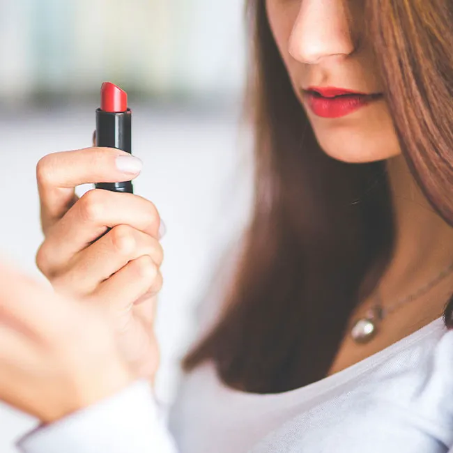 putting-on-red-lipstick