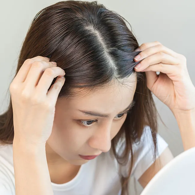 woman-checking-hair