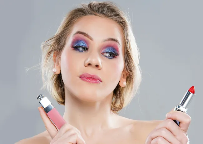 woman-choosing-lipstick