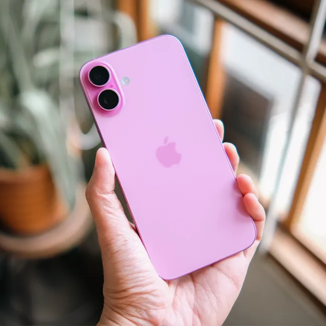 "Person holding the new iPhone during launch"