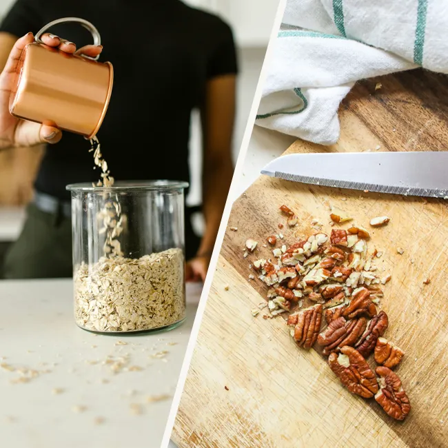 Woman pouring oats into a jar with pecans on a wooden board.