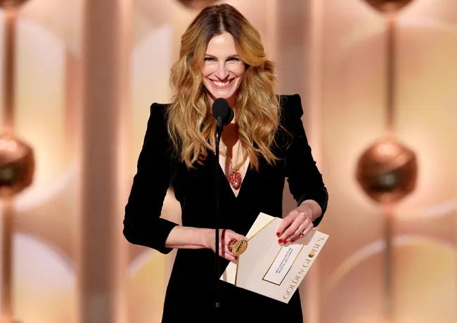 Julia Roberts long sleeve plunging black dress Golden Globes 2026