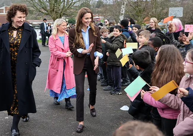 Kate Middleton brown blazer and pants blue shirt Castle Hill Academy