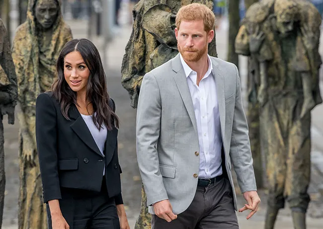 Prince Harry and Meghan Markle walking