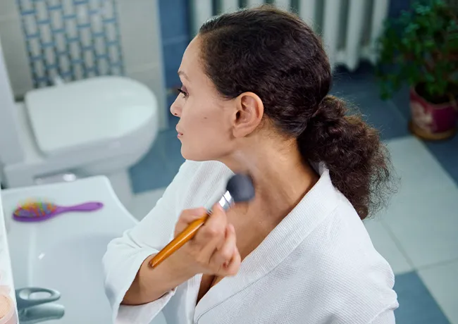 woman-blending-makeup-neck
