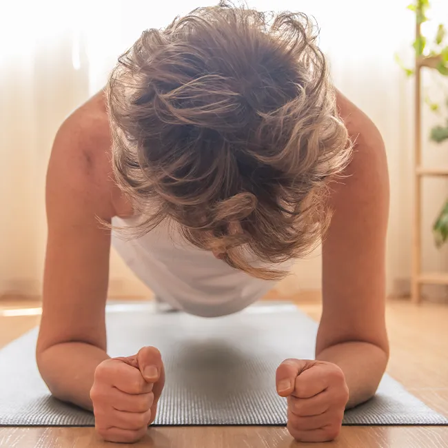 "Dumbbells on a table ready for an in-home workout"