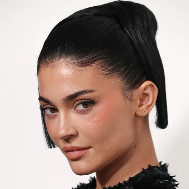 Kylie Jenner striking a pose at the CFDA Fashion Awards.