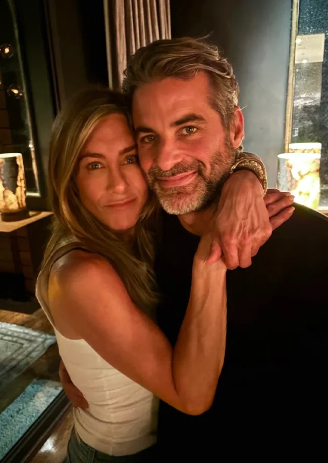 Jennifer Aniston and Jim Curtis on Instagram posing