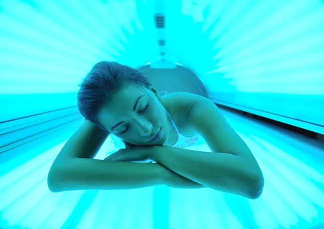 woman-in-tanning-bed