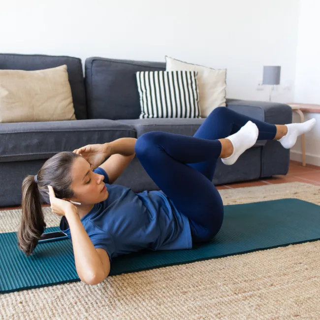 "Senior woman exercising in gym"