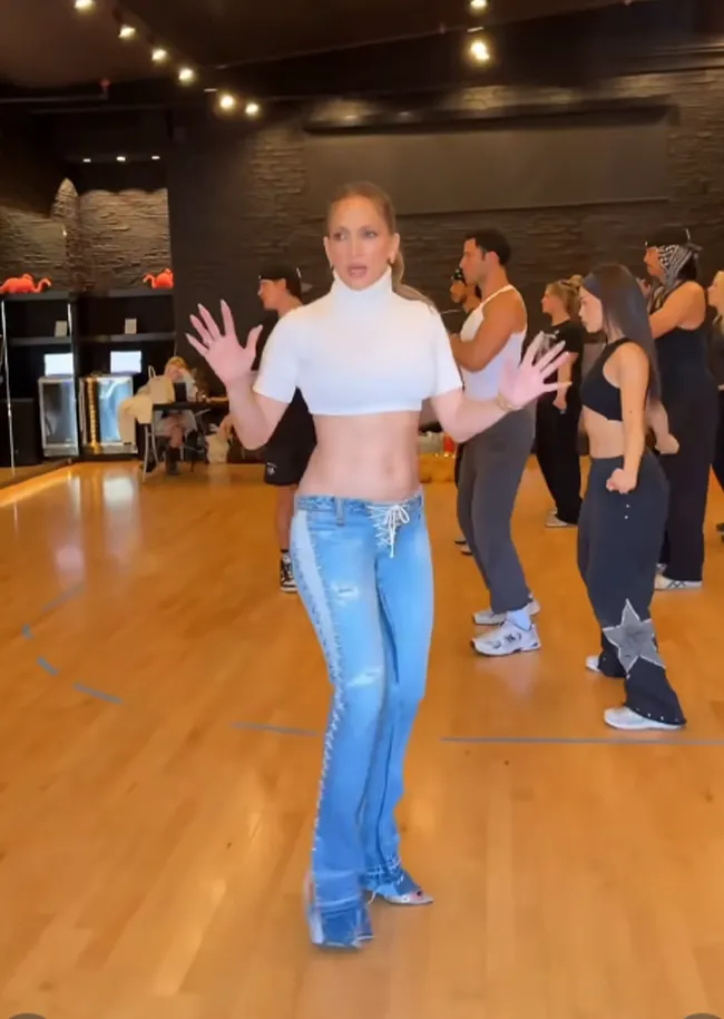 "Jennifer Lopez wearing her iconic jeans from 25 years ago"