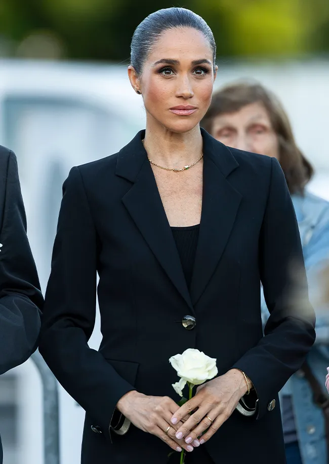 Meghan Markle Giorgio Armani suit Lost Screen Memorial art installation Geneva