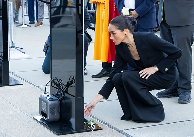 Meghan Markle Giorgio Armani suit Lost Screen Memorial art installation Geneva