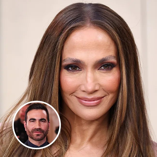 "Jennifer Lopez and Brett Goldstein at a premiere"