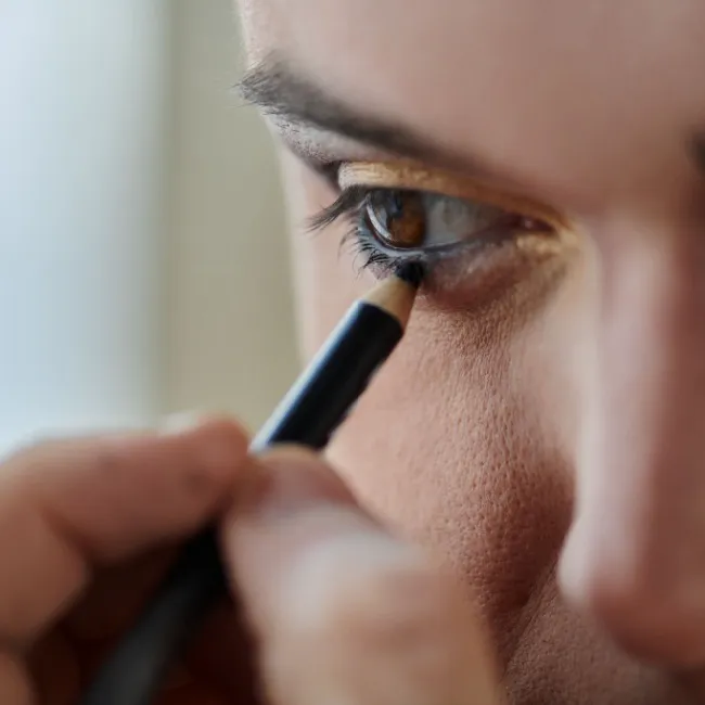 "Close-up of a middle-aged woman touching her face"