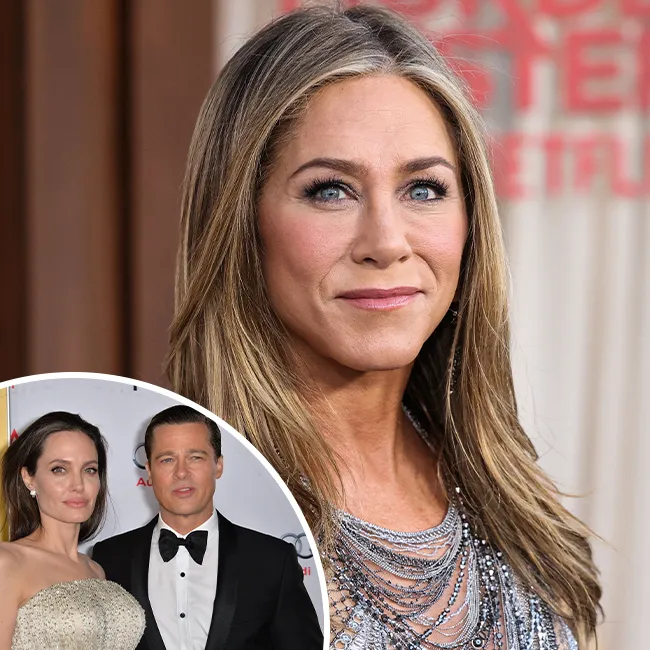 Angelina Jolie with Brad Pitt and Jennifer Aniston at a red carpet event.