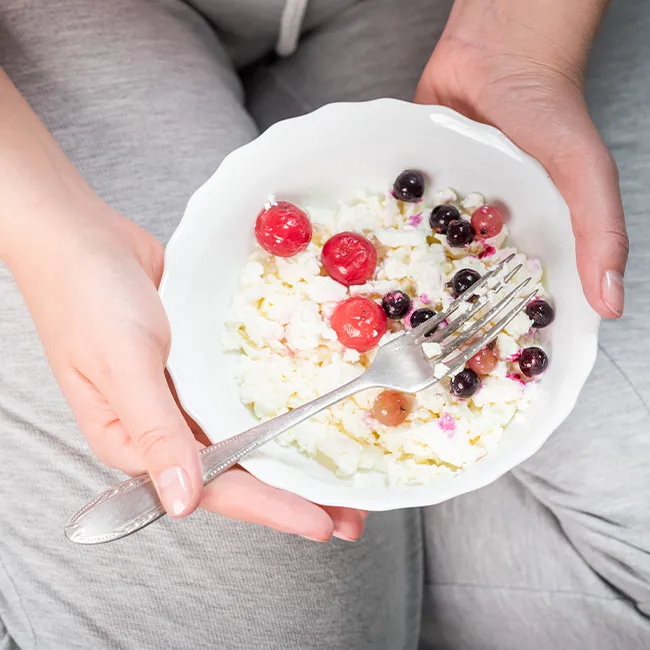 "Cottage cheese bowl topped with berries"