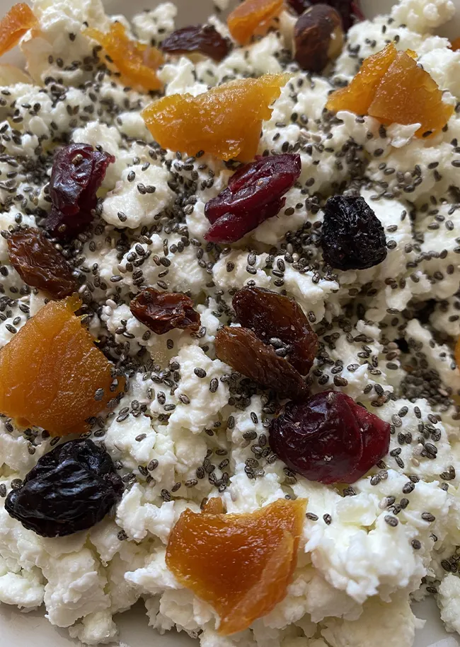 "Cottage cheese topped with berries and chia seeds"