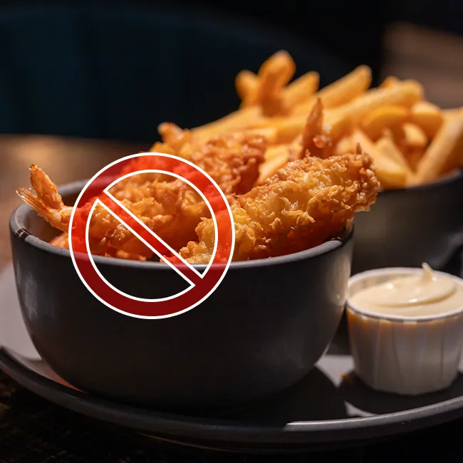 "Fried fish and fries served on a plate"